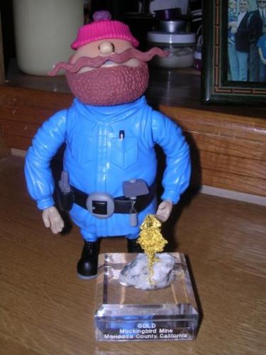 Yukon Cornelius with Gold from the Mockingbird Mine, Mariposa county, 
California.  Ho! Ho! Ho! (Author: Gail)