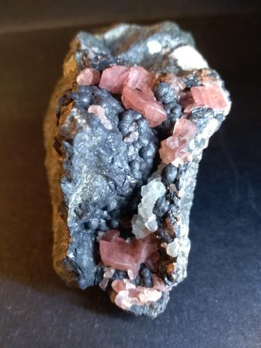 Rhodochrosite, Fluorite<br />Mina Uchucchacua, Provincia Oyón, Departamento Lima, Perú<br />71 x 65 mm<br /> (Author: Sante Celiberti)