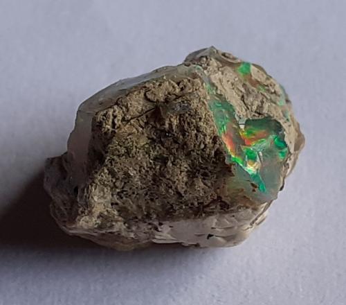 Opal (variety hydrophane)<br />Tsehay Mewcha, Wegeltena, Delanta District, Semien Wollo Zone (North Wollo Zone), Amhara Region, Ethiopia<br />1,3 x 1 cm<br /> (Author: Volkmar Stingl)