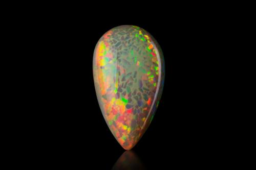 Opal (variety white opal)<br />Tsehay Mewcha, Wegeltena, Distrito Delanta, Zona Semien Wollo (Zona Wollo Norte), Región Amhara, Etiopía<br />3,3 x 2,3 x 0,9 cm<br /> (Author: MIM Museum)