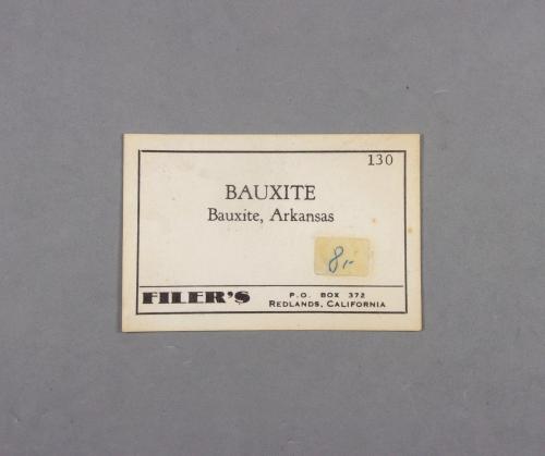 _Bauxita, etiqueta<br />Minas Bauxite, Bauxite, Condado Saline, Arkansas, USA<br />7,4 × 6,8 × 6 cm.  313 g.<br /> (Autor: J. G. Alcolea)