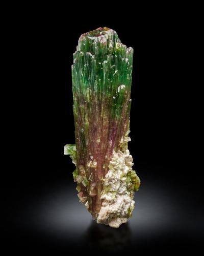 Elbaite with Albite (variety cleavelandite)<br />Paprok, Kamdesh District, Nuristan Province, Afghanistan<br />9 x 9 x 28 cm / main crystal: 27.0 cm.<br /> (Author: MIM Museum)