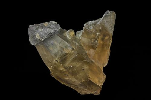 Quartz (variety smoky quartz), Calcite, Pyrite, Muscovite<br />Rist Mine, Hiddenite, Alexander County, North Carolina, USA<br />9.9 x 7.8 cm<br /> (Author: am mizunaka)