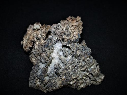 Silver with Bornite<br />Silver Miller Mine, Coleman Township, Cobalt area, Cobalt-Gowganda Region, Timiskaming District, Ontario, Canada<br />6.8x5.8x1.6 cm''s<br /> (Author: Joseph DOliveira)