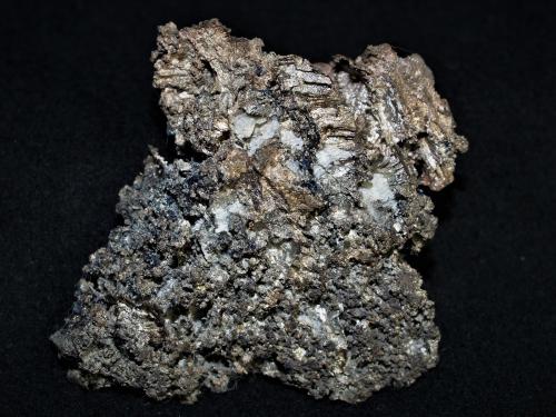 Silver with Bornite<br />Silver Miller Mine, Coleman Township, Cobalt area, Cobalt-Gowganda Region, Timiskaming District, Ontario, Canada<br />6.8x5.8x1.6 cm''s<br /> (Author: Joseph DOliveira)