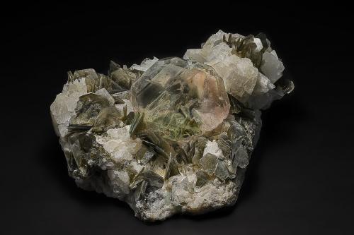Fluorite, Muscovite, Albite<br />Chumar Bakhoor, Hunza Valley, Nagar District, Gilgit-Baltistan (Northern Areas), Pakistan<br />13.6 x 12.9 cm<br /> (Author: am mizunaka)