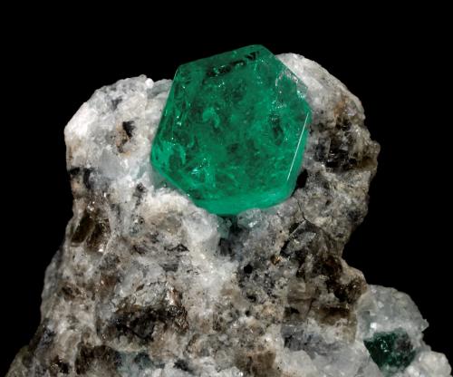 Beryl (variety emerald), Calcite, Pyrite<br />Coscuez mining district, Municipio San Pablo de Borbur, Western Emerald Belt, Boyacá Department, Colombia<br />33 x 16 x 29 mm, xl=3.5 (H) x 7.5 mm (Diam)<br /> (Author: Fiebre Verde)