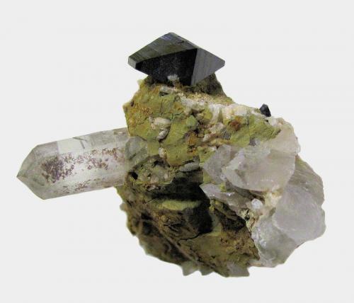 Anatase, Quartz<br />Zard Mountain, Ras Koh Mountains, Kharan District, Balochistan (Baluchistan), Pakistan<br />43 mm x 35 mm. Anatase:13,5 mm. Quartz: 17 mm. Mass (weight): 27 g<br /> (Author: Carles Millan)