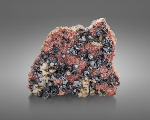 Diaphorite on Rhodochrosite and with Galena<br />Beschert Glück Mine, Zug, Freiberg District, Erzgebirgskreis, Saxony/Sachsen, Germany<br />11 x 9.5 x 4.5 cm / main crystal: 1.3 cm<br /> (Author: MIM Museum)