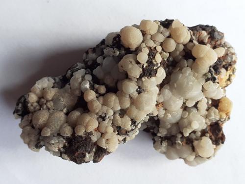 Smithsonite<br />Kamariza Mines, Agios Konstantinos, Lavrion Mining District, Attikí (Attica) Prefecture, Greece<br />6 x 4 cm<br /> (Author: Volkmar Stingl)