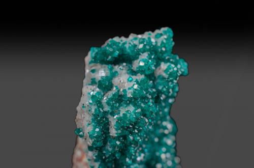 Dioptase on Calcite<br />Tsumeb Mine, Tsumeb, Otjikoto Region, Namibia<br />5.5cm x 5cm x 7.5cm<br /> (Author: k-m.minerals)
