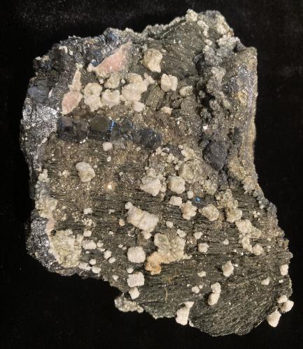 Pyrrhotite, Sphalerite, Galena, Pyrite, Rhodochrosite, Calcite<br />Complejo Trepča, Valle Trepča, Kosovska Mitrovica, Distrito Kosovska Mitrovica, Kosovo<br />133 mm X 90 mm X 57 mm<br /> (Author: Robert Seitz)