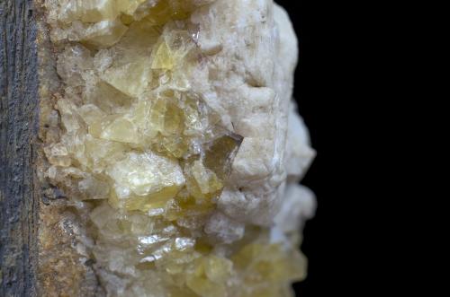 The calcite on yellow fluorite. (Author: k-m.minerals)
