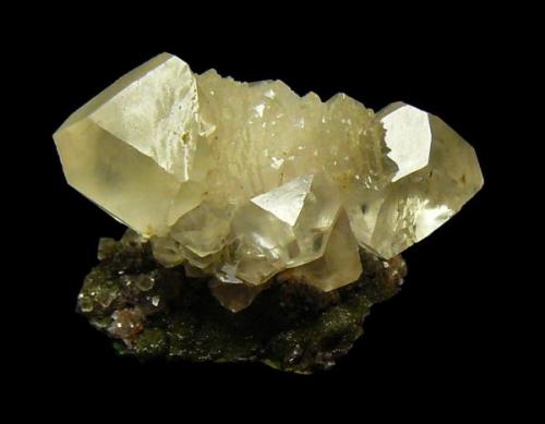 Calcite and duftite 
Tsumeb mine Namibia
2,5cm (Author: parfaitelumiere)