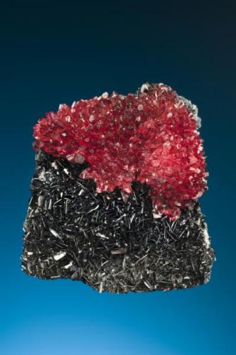 N’Chwaning mines, Kalahari Manganese fields, Northern Cape Province, South Africa, Rhodochrosite on bladed Manganite 
Size: 4.8 cm by 4.4 cm by 2.7 (Author: Gail)