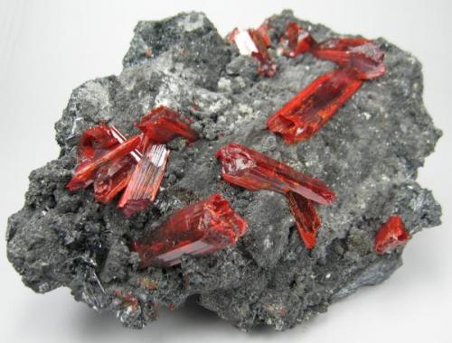 Realgar, stibnite
Baia Sprie (Felsöbánya), Maramures, Romania
106 mm x 71 mm. Main crystal: 9 mm wide, 24 mm long (Author: Carles Millan)