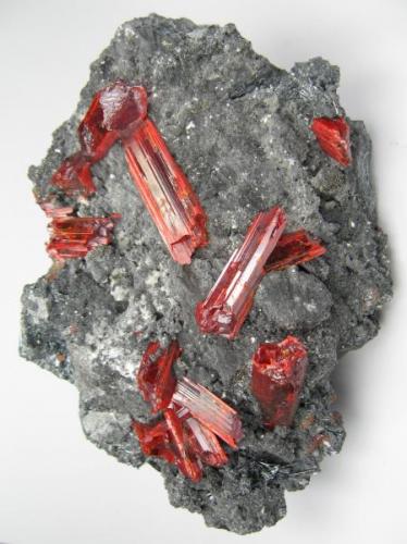 Realgar, stibnite
Baia Sprie (Felsöbánya), Maramures, Romania
106 mm x 71 mm. Main crystal: 9 mm wide, 24 mm long (Author: Carles Millan)