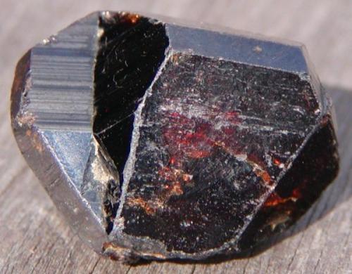 Cassiterite twin.
Krantzberg Mine, Omaruru, Namibia.
3.1cm x 2.3cm x 2.9cm (Author: Debbie Woolf)