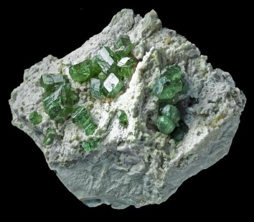 Andradite (var. Demantoid)
Ambanja District, Antsiranana, Madagascar
13 x 10 cm
Bigger crystal 3 cm (Author: Granate)