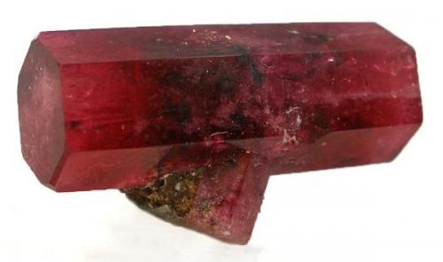 Red beryl, d/t, Wah Wah Mtns, Utah. 2.4 x 1 x 1 cm. (Author: Jim)