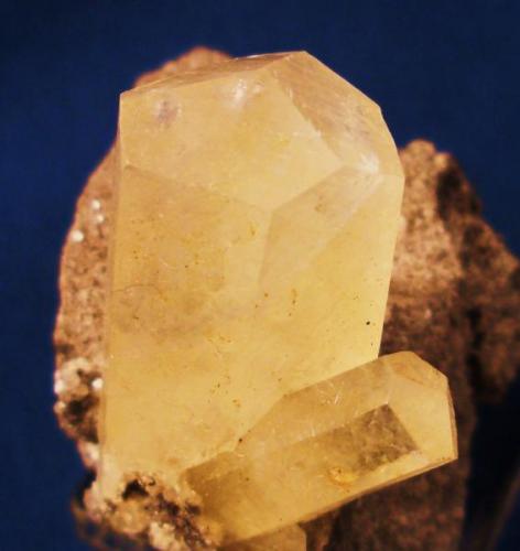 Here is my example of Sweetwater Mine, Missouri Calcite. The main crystal is 1 1/8" x 5/8" (2.8cm x 1.6cm) (Author: Jim Prentiss)