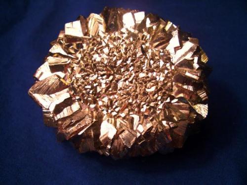 Here is a busy piece in this Pyrite crystal "Sunflower" from the Zhuang Autonomous Region, China. It is 3 1/4" in diameter (8,3cm). It could be used as a paper weight but I’d rather not. (Author: Jim Prentiss)