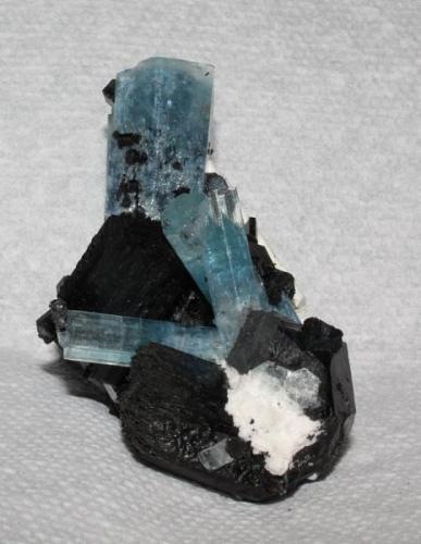 Aquamarine and schorl crystals with some feldspar from Erongo Mountain, Namibia. 7x5x4 cm. (Author: Jessica Simonoff)