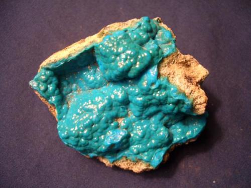 This Chrysocolla is yet another example of one of my favorite habits. Also, the blue color is, to me, quite attractive, despite the ugly matrix. It is 2 1/4" x 2" (5.72cm x 5.08cm) and is from the Kolwezi Mine, Kolwwezi, Western Area, Shaba Copper Belt, Shaba (Katnga), Democratic Republic of Congo (Zaire). (Author: Jim Prentiss)