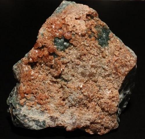 Grossular garnets of serpentine from Hunting Hill Quarry, Rockville, Maryland. 6x6x6 cm. (Author: Jessica Simonoff)