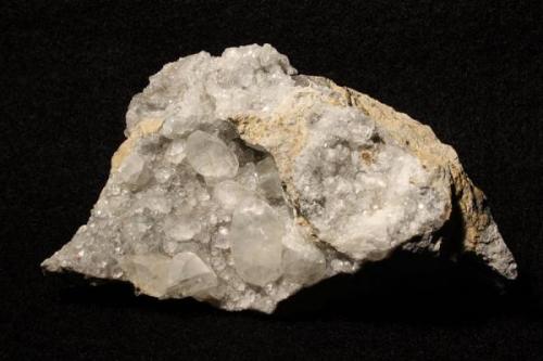 Calcite crystals from National Limestone Quarry, Pennsylvania. The crystals have an interesting habit but I’m not good enough at crystallography to know about them. 8x6x4 cm and the largest crystal is 2 cm long. (Author: Jessica Simonoff)