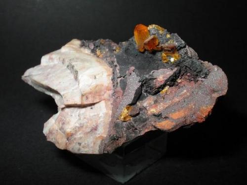 Good dark orange baryte crystals on hematite from the Krunkelbach Uranium prospect, Menzenschwand, Black Forest. Sample 7 cm. (Author: Andreas Gerstenberg)