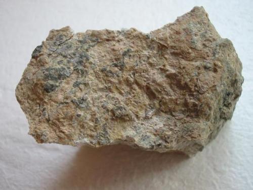 Blackish grey jordisite - a rare mo-sulfide from the Glückauf Shaft (type locality), Langenau, Freiberg district, Erzgebirge, Saxony. 6,5 cm sample. (Author: Andreas Gerstenberg)