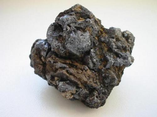This 5 cm wide sample with corroded galenite crystals is from Freiberg too but not that old as the above shown dolomite. It comes from a little new find at the Rote Grube in the very "city center" of Freiberg. The find contained I think some ten specimens and the sample looks forward to become a classic rarity one day. (Author: Andreas Gerstenberg)