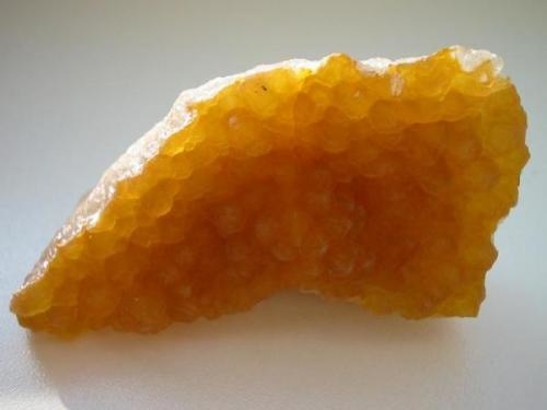Something for the quartz collectors: orange chalcedony layered on quartz in form of dauphiné penetration twins from a new find at the Segen Gottes mine, Gersdorf, Freiberg district, Erzgebirge, Saxony. 7 cm in width. (Author: Andreas Gerstenberg)