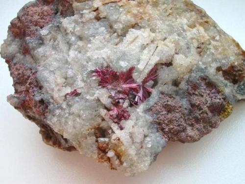 A real German classic are these erythrite sprays (approx. 2,5 cm in diamater) in quartz vugs from Daniel mine, Schneeberg, Erzgebirge, Saxony (type locality). (Author: Andreas Gerstenberg)