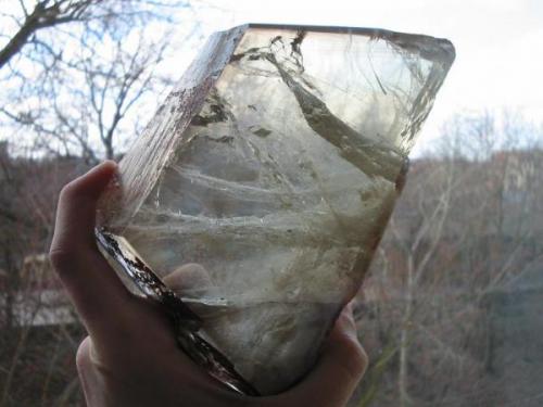 Polished smoky citrine, partly gemmy. From the gorgeous find by Rudolf Nestler in 1939/40 which developed three big crystals (40 cm each) and some small ones. The first of the three is now part of the Freiberg museum, the second of the one in Dresden and the third crystal has been split and cut - the shown pane is part of that very crystal... (Author: Andreas Gerstenberg)