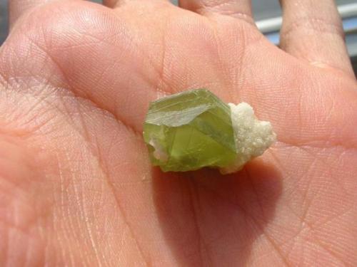 Green sphalerite twin with some white prehnite from Steinperf quarry, Sauerland, Hesse. The green sphalerites from Steinperf (and from the nearby location Hartenrod too) are very much sought-after - sometimes they have been cut and faceted! (Author: Andreas Gerstenberg)