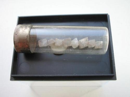 An extremely rare location: octahedron-like anhydrite crystals in a vial from the Conow potash mine, Lübtheen near Ludwigslust, Mecklenburg-Western Pomerania. Most collectors do not believe that there have been potash mines in Mecklenburg. But around 1920 there worked three mines on a small salt dome which has been developed in a lime quarry. There is not much been published about these potash mines and in fact there are no mineral pictures on web... (Author: Andreas Gerstenberg)