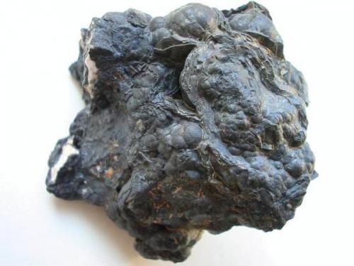May be the best location for German lithiophorites: Lenzhahn quarzite quarry, Idstein, Taunus, Hesse. Sample 6 cm. The mineral is often accompanied by yellowish florencite. (Author: Andreas Gerstenberg)