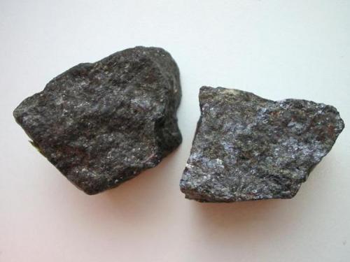 Christophite - a dark ferroan sphalerite from the St. Christoph mine, Breitenbrunn, Erzgebirge, Saxony. Two massive ore samples (3,5 cm each) with old Bergakademie Freiberg label. (Author: Andreas Gerstenberg)