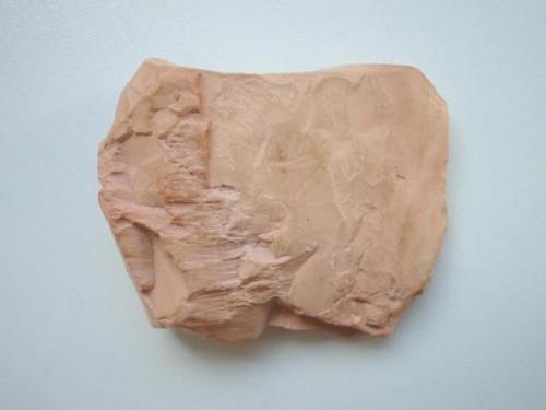Reddish kaolinite (so-called tailor chalk) from the Rochlitzer Berg quarry, Rochlitz, Saxony. 6,5 cm sample. (Author: Andreas Gerstenberg)