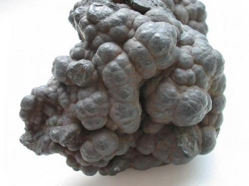 Psilomelane nodules as a 7 cm wide classic from the Neue Weintraube mine, Magdgrabtal near St. Andreasberg, Harz. (Author: Andreas Gerstenberg)