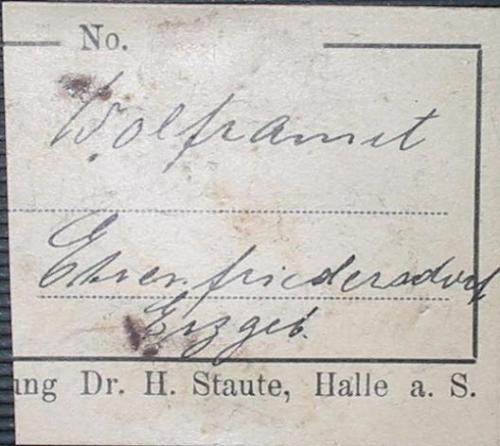 Hermann Staute (Halle) label (1920) of a wolframite from Sauberg mine, Ehrenfriedersdorf, Saxony. (Author: Andreas Gerstenberg)