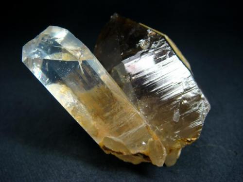 Topaz crystal, that sitting on smoky quartz - classical specimen from Groot Spitzkoppe, Swakopmund District, Erongo Region, Namibia

Size 60 x 50 x 45 mm (Author: olelukoe)
