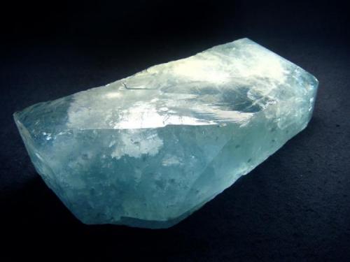 Part of XL Topaz crystal, with some areas of gem quality and perfect termination, this size and quality to rare for specimens from  this old Russian locality, locality name: Mokrusha Mine, Alabashka pegmatite field, Yuzhakovo Village, Ekaterinburgskaya (Sverdlovskaya) Oblast’, Middle Urals, Urals Region, Russia

Size 130 x 66 x 27 mm (Author: olelukoe)