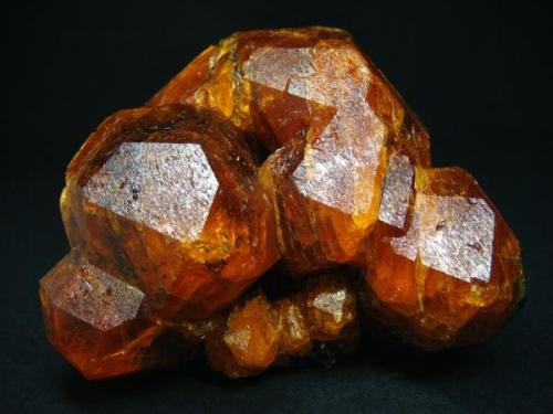 Large Spessartine cluster, Nani, Loliondo, Arusha Region, Tanzania

Size 70 x 60 x 65 mm (Author: olelukoe)