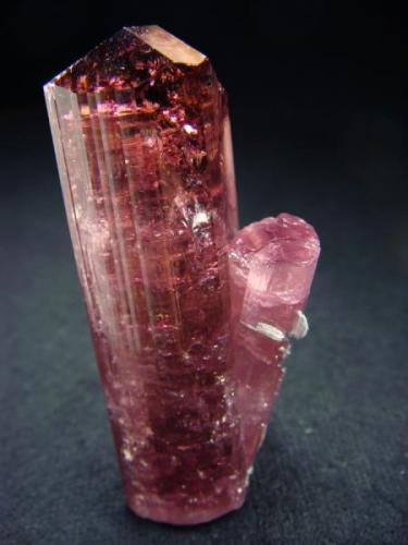 Perfect quality and coloure tourmaline crystals cluster, from Malkhan Pegmatite field, Sosedka vien.

Size 24 x 21 x 55 mm (Author: olelukoe)