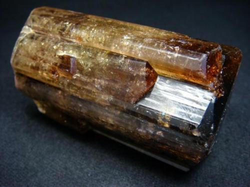 Polychromic large tourmaline crystal with few parallel baby crystals at the sides, perfect termination and very interesting colour changing  from the cap to the base, from Malkhan Pegmatite field, Zapadnaya vien

Size 66 x 37 x 37 mm (Author: olelukoe)