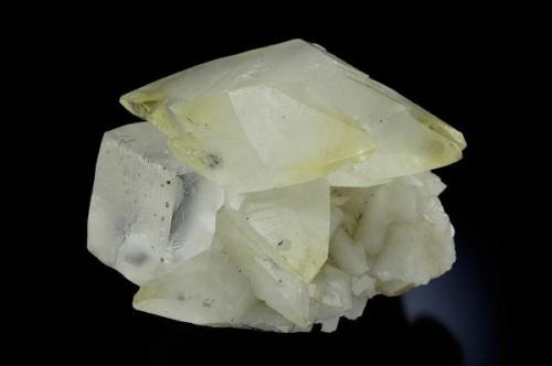 The combination between a cube of fluorite and a scalenohedral crystal of calcite is very nice. This sample comes from the "Emilio" mine near to the village of Loroñe, Caravia-Berbes region.
The crystal of Calcite have 8 cm long.
Jeff Scovil Photo (Author: jrg)