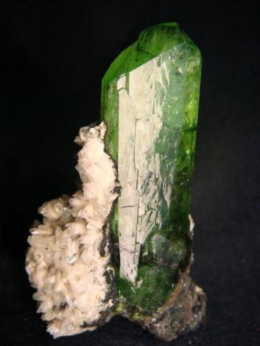 Diopside crystal, Merelani Hills (Mererani), Lelatema Mts, Arusha Region, Tanzania

Size 55 x 32 x 20mm (Author: olelukoe)